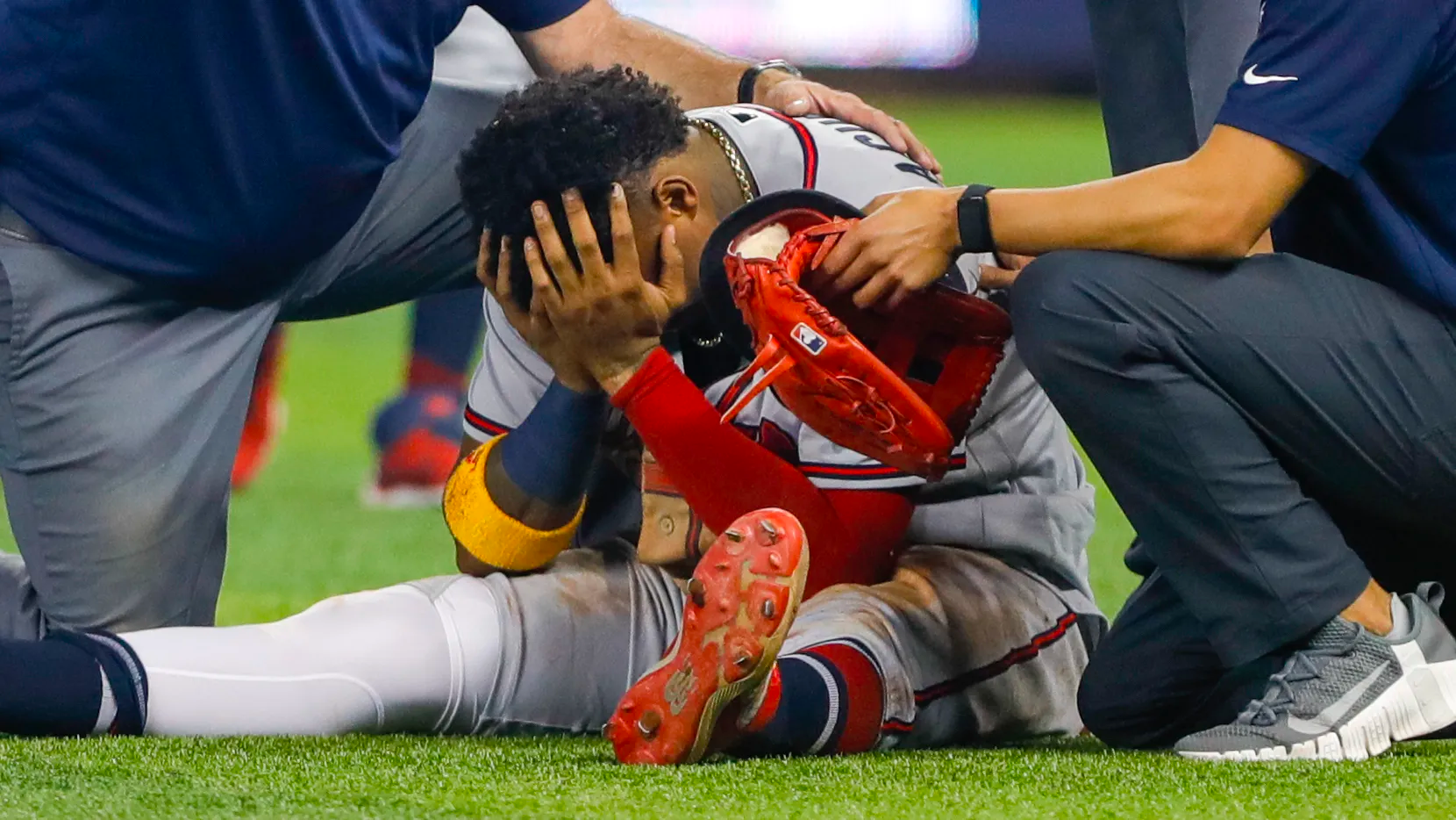 Ronald Acuña in the floor of the game field - 2021